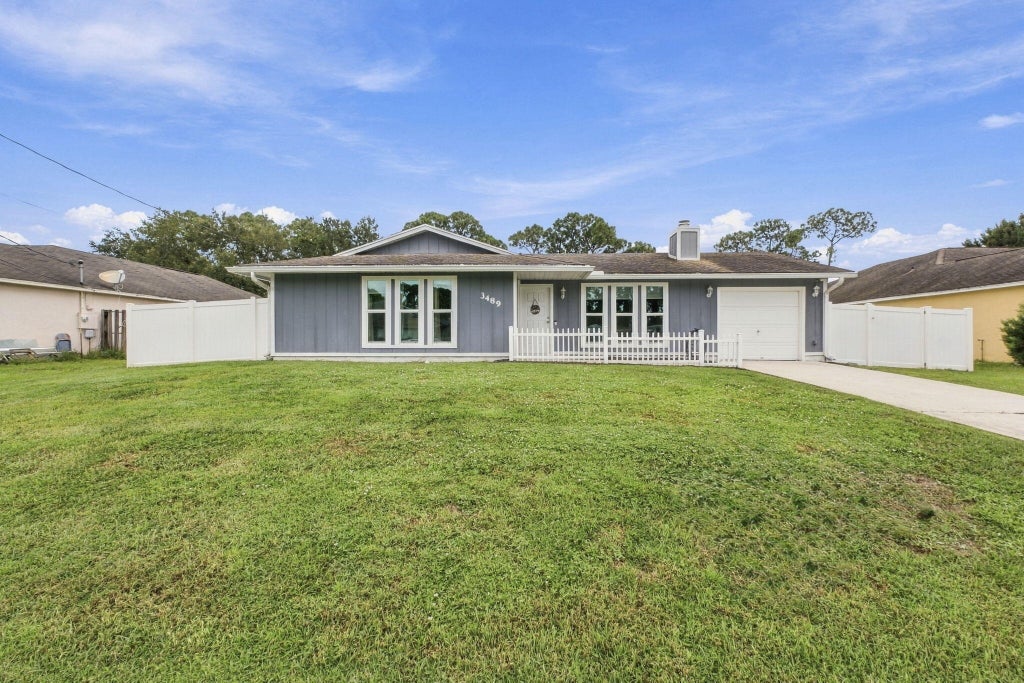 Photo of 3489 SW Englewood Street, Port Saint Lucie, FL 34953 (MLS # B26075467)
