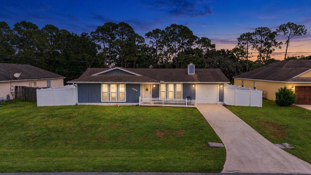 Photo of 3489 SW Englewood Street, Port Saint Lucie, FL 34953 (MLS # B26075467)