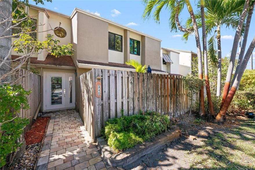 Luxury 2/2.5 townhome located right in Downtown Fort Lauderdale! FEATURING: Designer kitchen w/ SS appliances, custom cabinetry, quartz countertops, wine fridge & pantry. IMPACT windows & doors, tile & wood flooring, recessed lights, glass balustrade, full-size laundry & central A/C. Spacious primary suite with walk-in closet, en-suite bath & pool views. Private front & back patios plus EV charger. Quiet interior unit backing up to pool & clubhouse. City View is a fully gated 18-acre community that borders Flagler Village and the Brightline Train Station. Easy walk to The Riverwalk, Las Olas Blvd and Himmarshee. Enjoy the community heated pool and tennis court. One dog allowed! Parking decals for two vehicles + guest parking. Can be fully furnished!