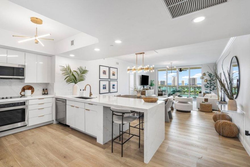 Beautiful! Direct east facing condo w amazing sunrise, ocean & Intracoastal views! Completely remodeled w/high end finishes, impeccably maintained 3BR/3.5BA condo, marble primary bath w/soaking tub, full size washer & dryer, crown molding, semi-private elevator access, Impact glass, LVT floors throughout (no carpet). Highly desirable water views from private covered balcony. Marina Grande has wonderful amenities: New Rooftop Pool, hot tub, bbq areas, tennis/pickleball courts. Valet service, covered parking, fitness center, social room, EV charging stations & 24hr manned guard gate. Adjacent marina with dry docks available, just off the Intracoastal & minutes to inlet. Furniture negotiable.