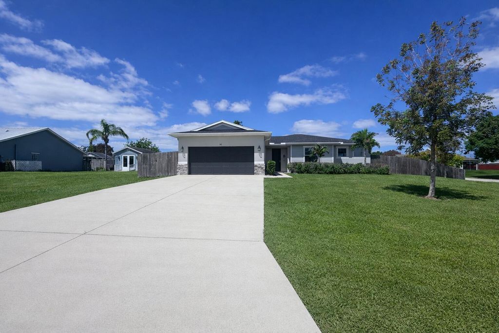 Photo of 110 SW Pilsner Circle, Port Saint Lucie, FL 34953 (MLS # B26016411)