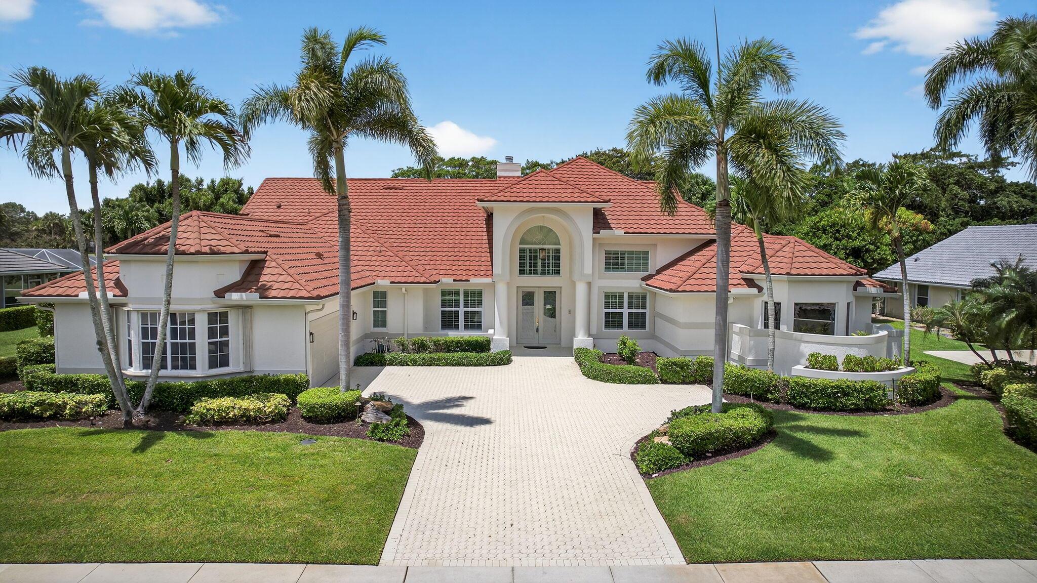 Welcome to this beautifully upgraded and impecably maintained home in the heart of Wellington, with low HOA fees, and top-tier features throughout. Just a few miles from WEF and Global Dressage, this meticulously maintained home boasts a durable metal roof (installed in 2016), a brand-new 2024 AC unit, vent system, and air handler for the master suite & office, plus a second AC unit with a 2024 air handler and 2019 outside unit. Enjoy peace of mind with full hurricane protection including impact windows on the front & accordion shutters on the back, 2 hurricane break-out panels on the screen-enclosed pool patio, and a whole-house automatic Generac generator powered by a 500-gallon underground propane tank,