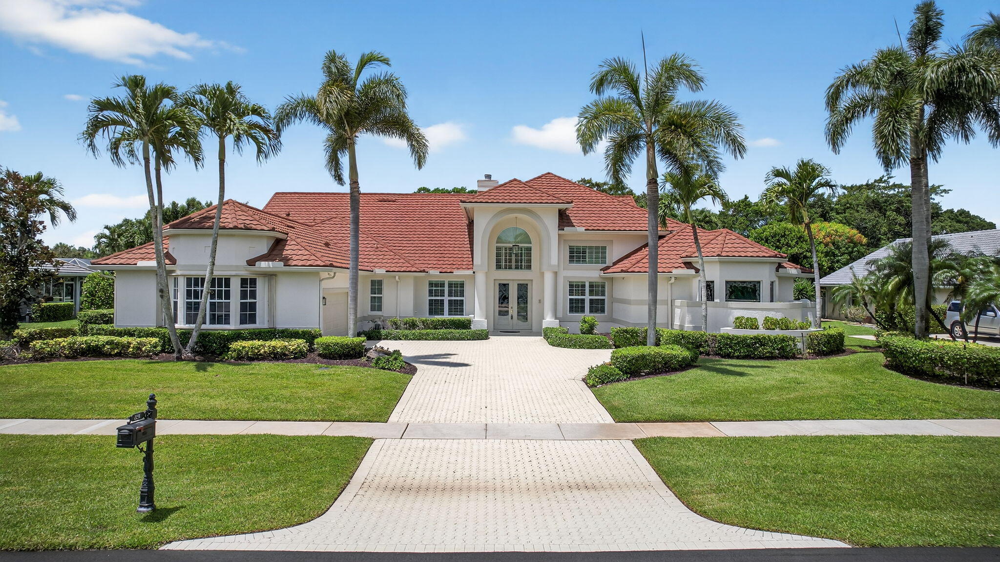 Welcome to this beautifully upgraded and impecably maintained home in the heart of Wellington, with low HOA fees, and top-tier features throughout. Just a couple miles from WEF and Global Dressage, this meticulously maintained home boasts a durable metal roof (installed in 2016), a brand-new 2024 AC unit, vent system, and air handler for the master suite & office, plus a second AC unit with a 2024 air handler and 2019 outside unit. Enjoy peace of mind with full hurricane protection including impact windows on the front & accordion shutters on the back, 2 hurricane break-out panels on the screen-enclosed pool patio, and a whole-house automatic Generac generator powered by a 500-gallon underground propane tank,