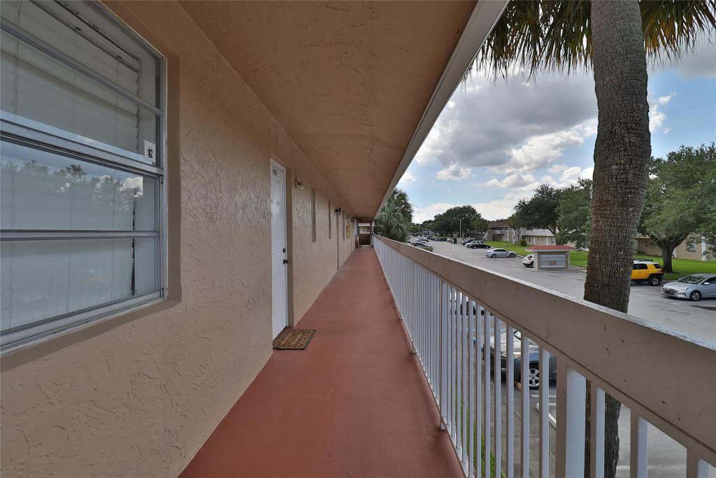 Photo of 9930 Twin Lakes Drive #7-L, Coral Springs, FL 33071 (MLS # F10517827)