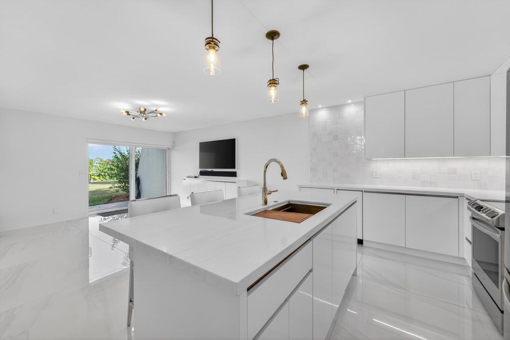 Photo of 725 Hummingbird Way #103, North Palm Beach, FL 33408 (MLS # R11155003)