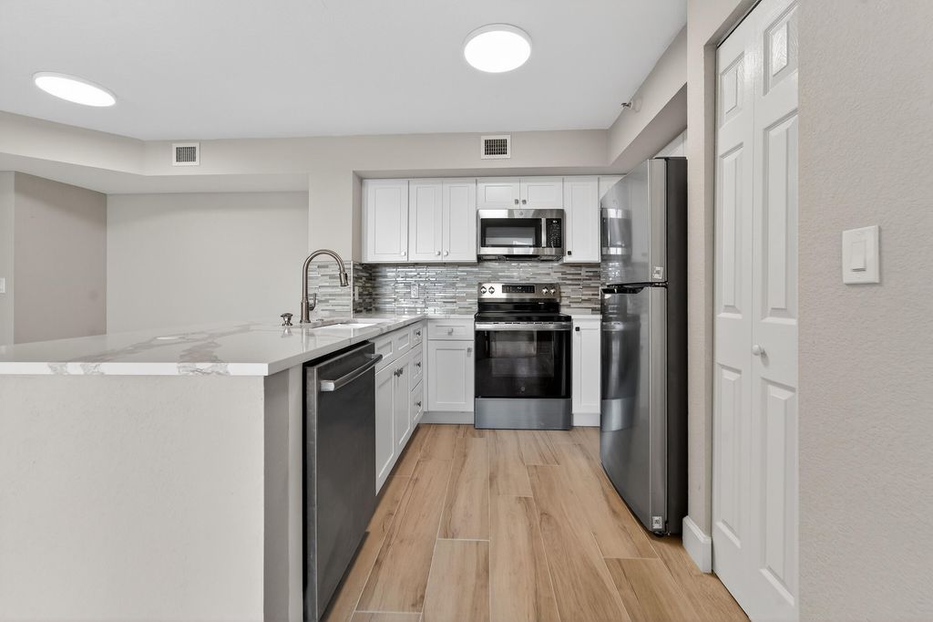 Photo of 167 Yacht Club Way #104, Hypoluxo, FL 33462 (MLS # R11149074)