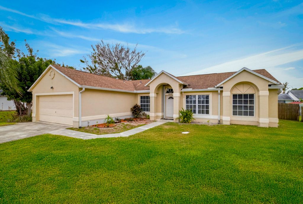 Photo of 1044 SW Payne Avenue, Port Saint Lucie, FL 34953 (MLS # B26017481)