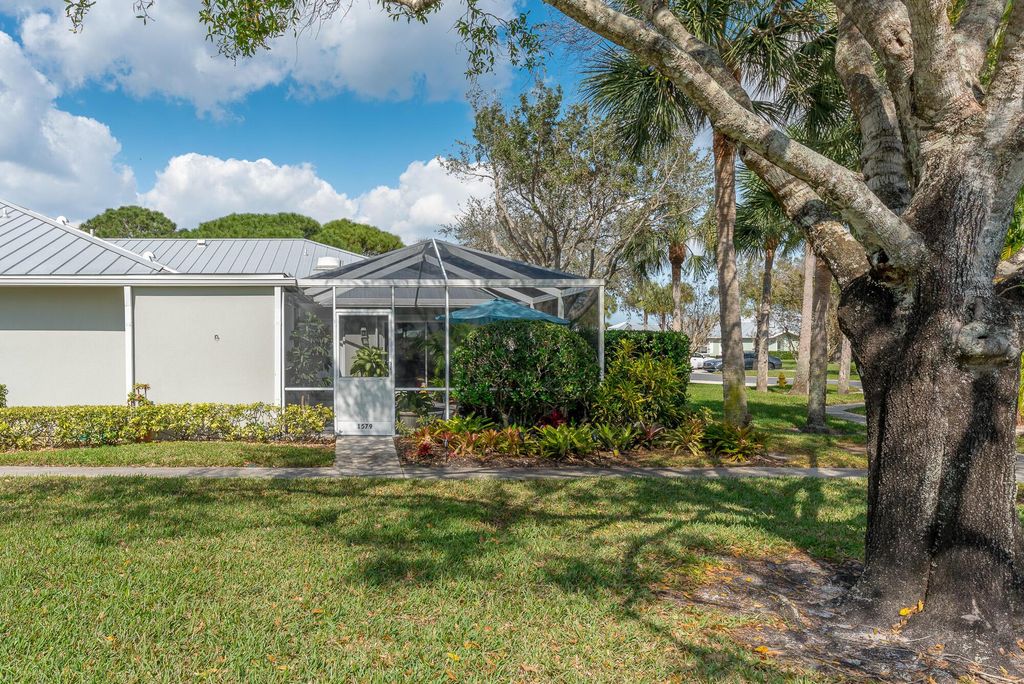 Photo of 1579 SW Waterfall Boulevard, Palm City, FL 34990 (MLS # R10968169)