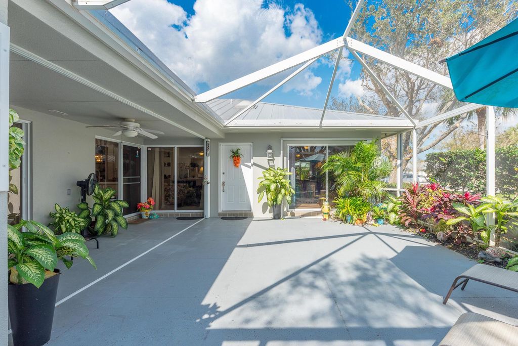 Photo of 1579 SW Waterfall Boulevard, Palm City, FL 34990 (MLS # R10968169)