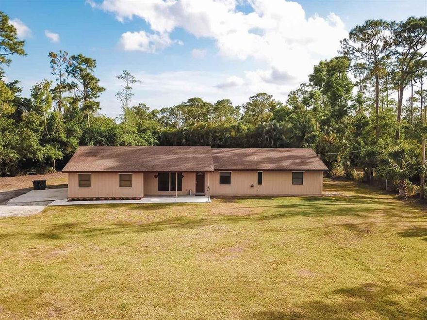 'EXCELLENT LOCATION'' SPACIOUS HOME (1932 SQ FT) 4 BEDROOM 2 BATH 2 CAR GARAGE ON 1.14 ACRE. FULLY FENCED FOR PETS, OPEN FRONT PORCH W/KEY LOCK ENTRY,LIVING ROOM
MASTER AND GUEST BEDROOM HAVE WOOD FLOORING, CROWN MOLDING, CERAMIC TILE IN REST OF LIVING AREA. HOME HAS BEEN FRESHLY PAINTED INSIDE AND OUT. WITH NEW CARPET IN TWO BEDROOMS, LARGE KITCHEN WITH BREAKFAST BAR, LARGE FAMILY ROOM, SEPERATE DINNING AREA, HUGH LAUNDRY ROOM WITH FRONT LOAD WASHER AND DRYER, OPEN PATIO W/BUILT IN BAR B Q GRILL, WORK SHED FOR LAWN EQUIPMENT ETC.. NEW CITY OF WEST LAKE LESS THAN 5 MILES AWAY, PALM BEACH STATE COLLEGE CAMPUS MINUTES AWAY ON SOUTHERN BLVD. NEW PUBLIX SHOPPING CENTER. PALMS WEST ONLY 10 MINUTES AWAY