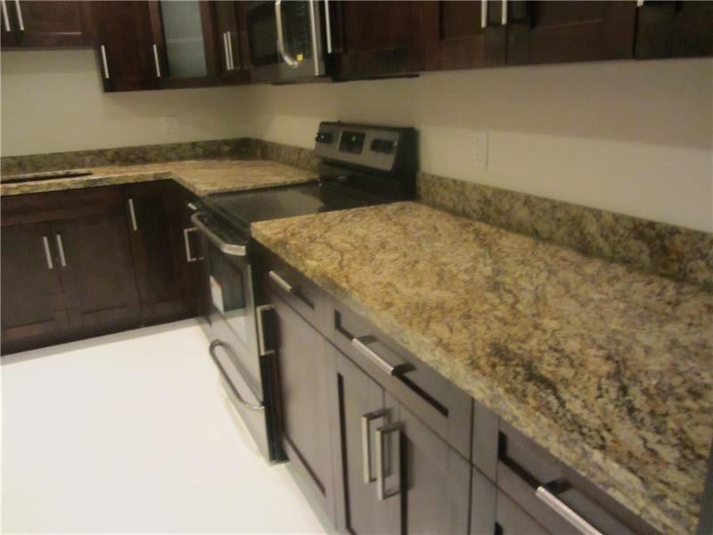 Photo of 8761 Holly Court #201, Tamarac, FL 33321 (MLS # B26083219)