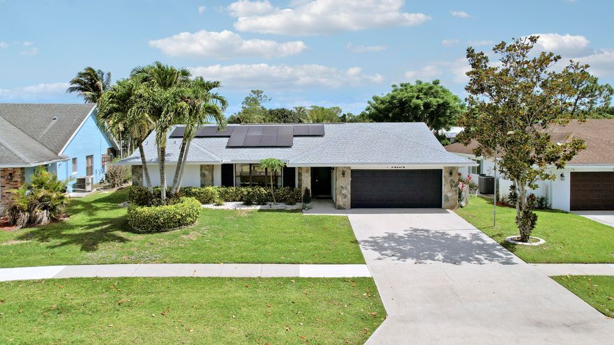 Welcome to this beautifully remodel home located in the heart of Wellington, one of South Florida's most desirable communities. This spacious property offers a bright, open layout with abundant natural light, perfect for comfortable living and entertaining. The home features well appointed bedrooms, updated finishes, and a functional floor plan that suits a variety of lifestyles. Enjoy a large backyard with plenty of room for outdoor activities, pets, or future enhancements. The property is situated in a quiet, family friendly neighborhood with A rated schools, nearby parks, shopping, dining, and Wellington's world renowned equestrian venues. Whether you're a first time buyer, growing family, or investor, this home delivers exceptional value in a prime location.  New Roof, Solar Panels, A/C and water Heater are five year old.