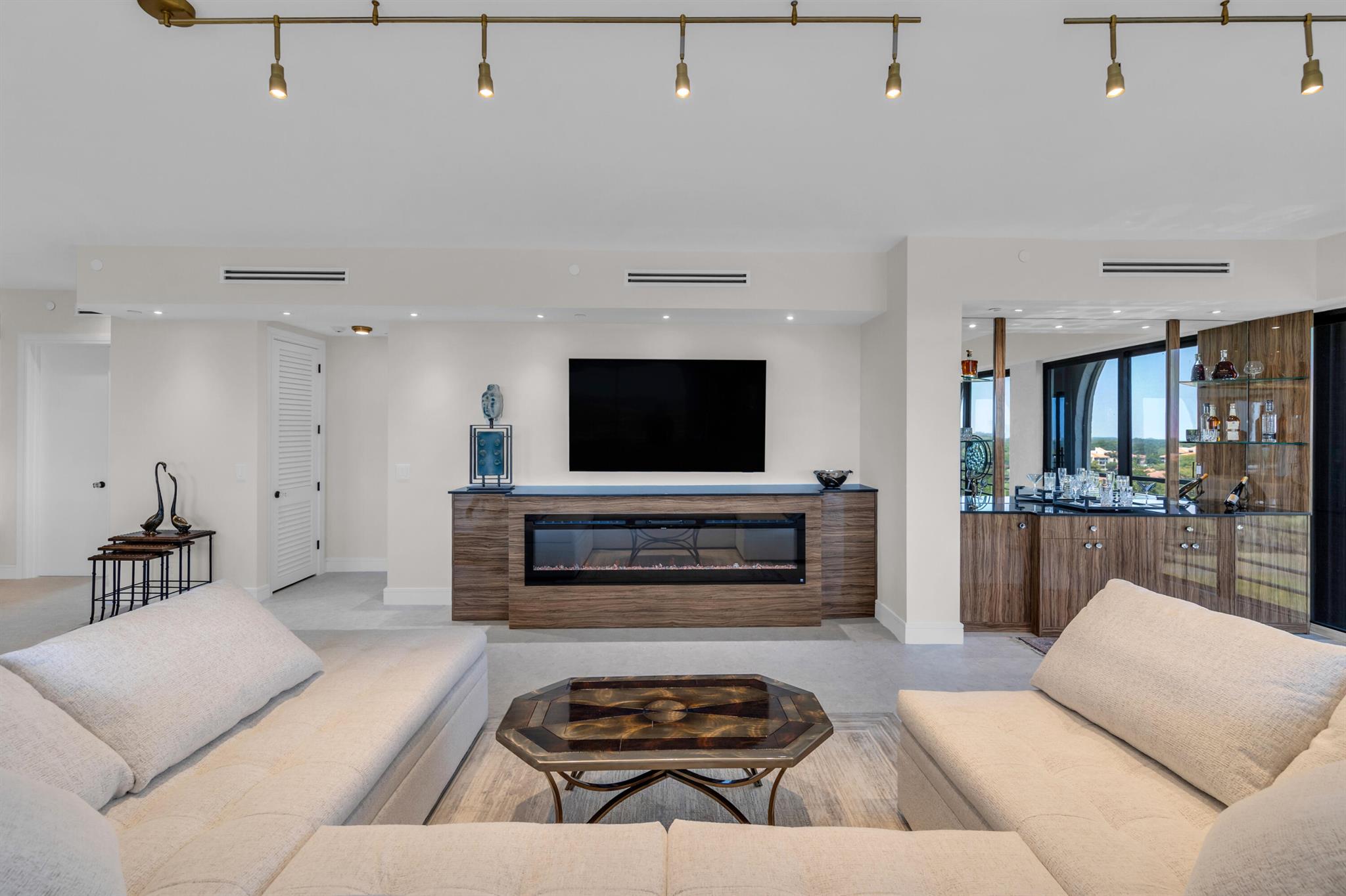 Over 3000 sqft of living space, this fully renovated turn-key PH offers high ceilings, sprawling golf-course views and optional club membership - all in a gated community conveniently located in central Boca. 3 BR/2.5 BA, the open floor plan is ideal for guests & entertaining. Custom cabinetry/closets, Thermador kitchen, porcelain/natural stone throughout and a dramatic primary ensuite spa- the space sleekly blends modern design with natural textures. Imperial Royale is the premier condo of Boca Pointe w/ assigned indoor garage parking, extra storage and only 2 units per floor.