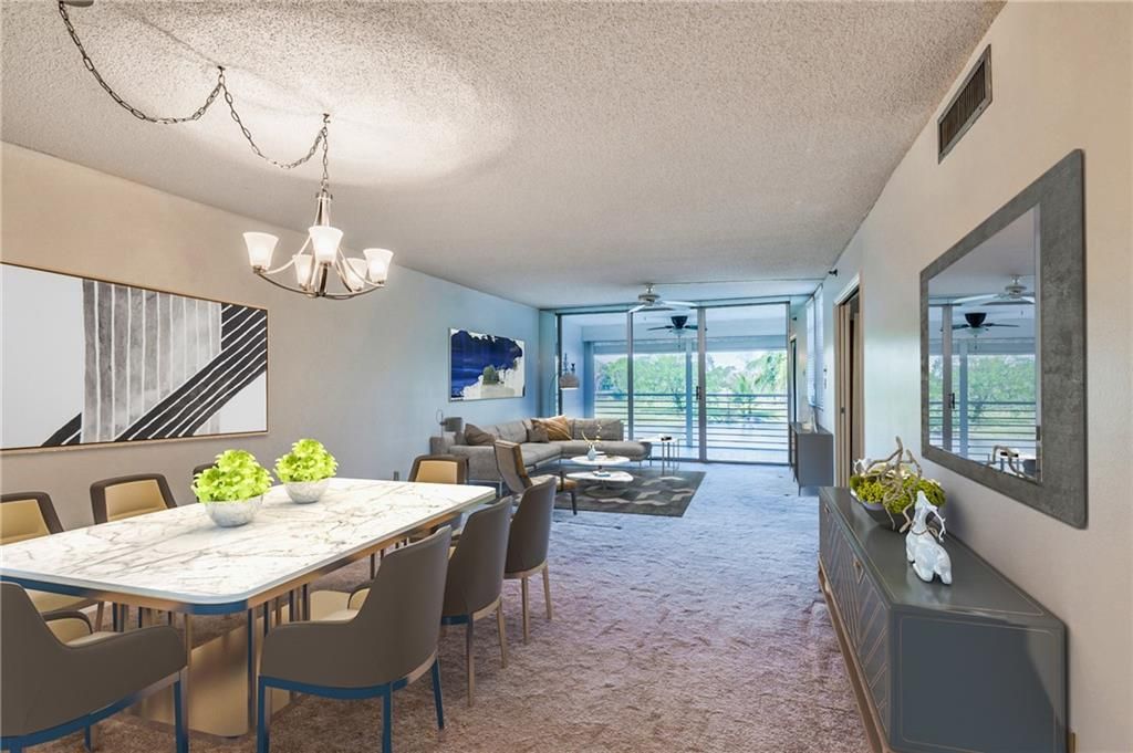 Photo of 3499 Oaks Way #203, Pompano Beach, FL 33069 (MLS # F10275319)
