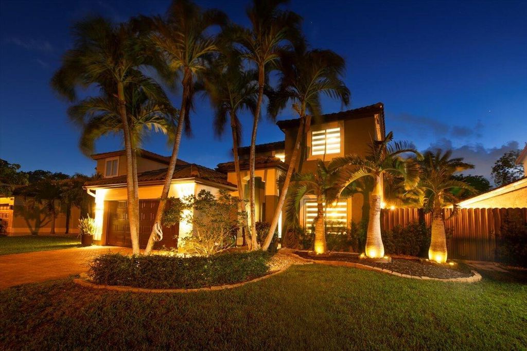 Photo of 5541 NW 51st Avenue, Coconut Creek, FL 33073 (MLS # R11090440)