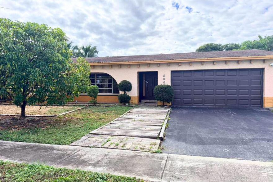 Spacious 4BR/2BA Pembroke Pines home with 2,790 SF on an oversized 8,660 SF waterfront lot. Bright split-floorplan, tile throughout, walk-in closets, accordion shutters, and an updated kitchen with granite, pantry, and stainless appliances. Enjoy a screened patio, private pool, fruit trees, and 80 ft. canal views (no ocean access). Features include a 2-car garage with laundry, RV/boat parking, newer mechanicals, and CBS construction. No HOA. Prime location near top schools, parks, dining, shopping, and highways. Move-in ready and perfect for entertaining.