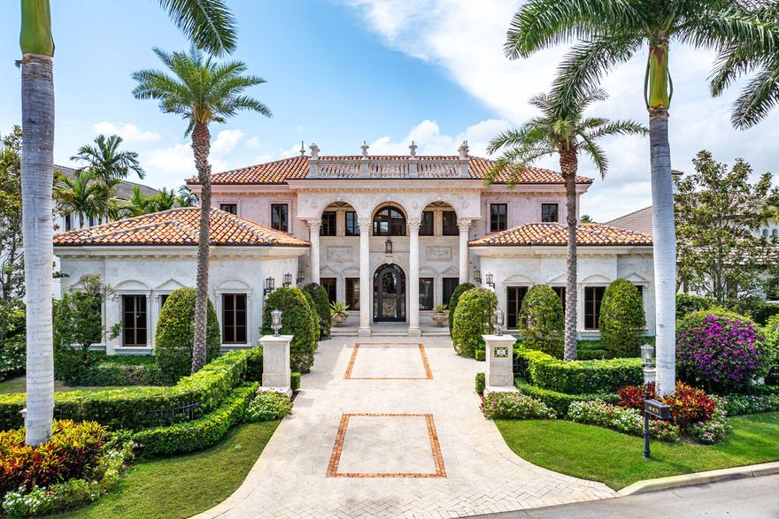 Villa Diassi is a waterfront work of art, nestled along the prestigious Buccaneer Palm Waterway with direct Intracoastal access. Designed for those who demand excellence, this five-bedroom residence, enhanced by a club room and private library, is a rare blend of timeless Venetian architectural distinction and coastal elegance. Sunlight pours over the estate's western-facing outdoor spaces, where a heated infinity-edge pool creates an exquisite setting for leisure and grand entertaining. A covered patio with retractable screens extends the home's indoor luxuries to the outdoors through vanishing sliding glass doors. At the heart of Villa Diassi, a gourmet kitchen impresses with dual center islands, premium appliances, and superior craftsmanship, setting the stage for inspired culinary pursuits. Upstairs, the primary suite is a private sanctuary featuring His & Her baths and dressing rooms, a morning bar, and a private balcony overlooking the serene waterway and pool.

Thoughtfully engineered for peace of mind and enduring comfort, the home has natural gas, a generator, an elevator, Lutron lighting, a yacht-ready dock, and impact glass, further enhancing Villa Diassi's uncompromised lifestyle.