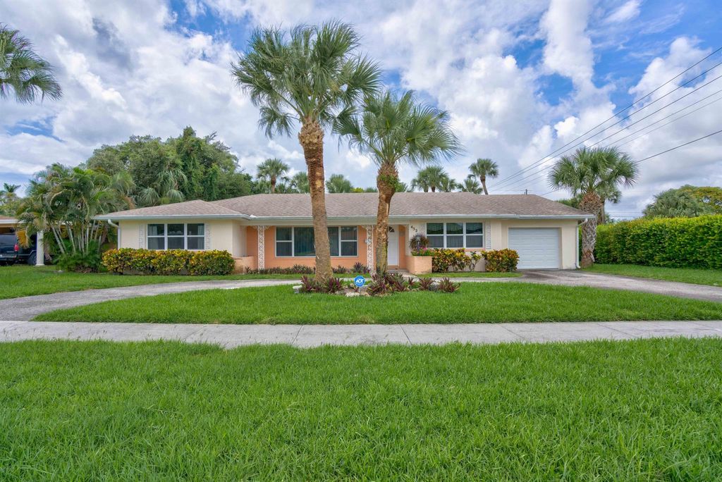 Photo of 452 Date Palm Drive, Lake Park, FL 33403 (MLS # R10906543)