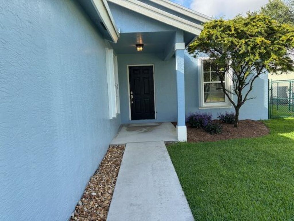 Photo of 2844 SW Regal Terrace, Stuart, FL 34997 (MLS # R11092814)