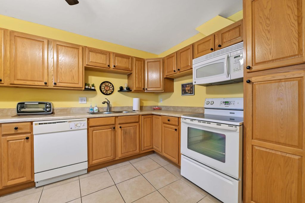 Photo of 5725 Fernley Drive E #8, West Palm Beach, FL 33415 (MLS # B26019875)