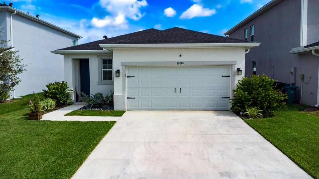 Photo of 10885 SW Robbia Way, Port St Lucie, FL 34987 (MLS # R10916143)