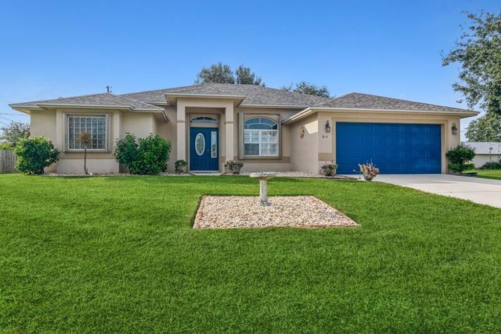 Photo of 814 SW Thrift Avenue Ave, Port Saint Lucie, FL 34953 (MLS # R10759960)