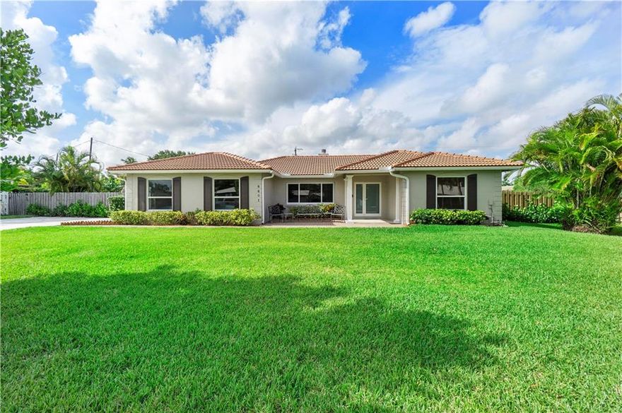 PRICE REDUCED!!! Motivated Seller is relocating! Don't miss out on this opportunity! YOUR DREAM HOME IS RIGHT HERE!!! This home has many upgrades, including Newer AC Unit, Newer Roof, All New Impact Windows and Doors, Fire Place, Extra Enclosed Back Room that can be used for an Extra Bedroom, Office, Bar area and more! Wait until you see the outside of this place! Oversized side lot separately fenced in, Extra storage 10X10 Shed, 12 Car driveway, Newer Driveway, Newer Gutters, THE LUXURIOUS OVERSIZED TIKI HUT, OVERSIZED LOT, Side yard Space for all toys, Built in Barbecue, Outdoor Fridge, Beautiful pavers, Pool recently fully re-done, New Large Driveway to fit many cars and more! NO HOA!