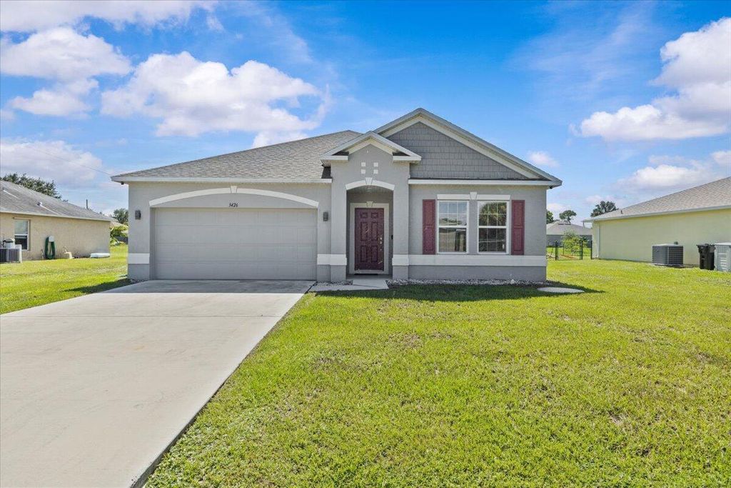 Photo of 3426 SW Pluto Street, Port Saint Lucie, FL 34953 (MLS # R11106816)