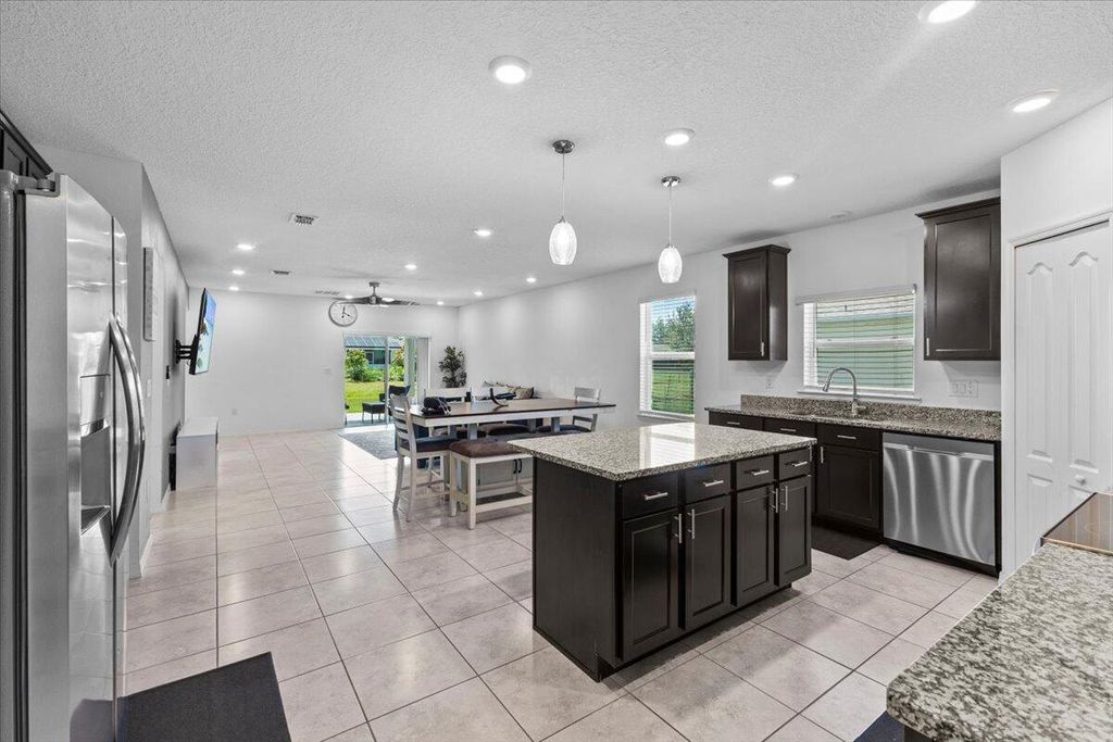 Photo of 3426 SW Pluto Street, Port Saint Lucie, FL 34953 (MLS # R11106816)