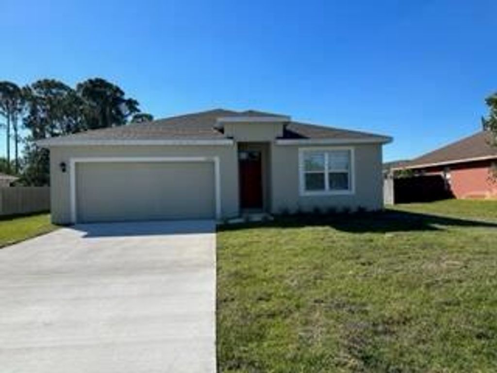 Photo of 1670 SE Trumpet Lane SE, Port Saint Lucie, FL 34983 (MLS # R10858666)