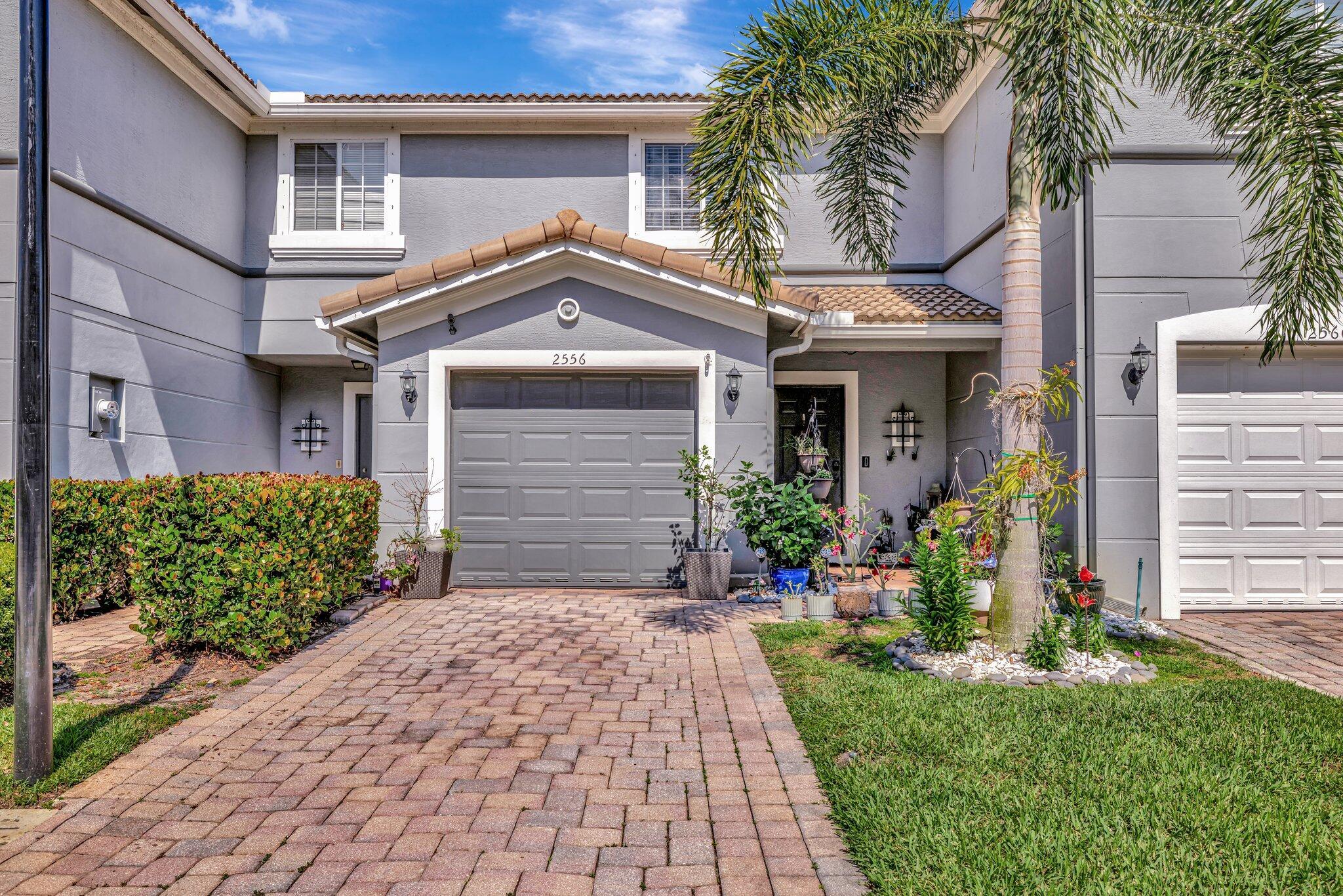 Discover lakeside living at its finest in this beautifully upgraded 2BR/2.5BA townhome in Newport Isles. With serene water views, preserve frontage, and stylish finishes throughout, this home features granite countertops, stainless appliances, smart home technology, and new A/C and water heater and electric panel (2023). Enjoy low HOA fees, resort-style amenities,24/7 security, Internet, and more and a prime location just minutes from Tradition Village, I-95, and the Turnpike. Newport Isles is where it's at. 📞 Message us to tour this move-in-ready gem--your dream townhome awaits!