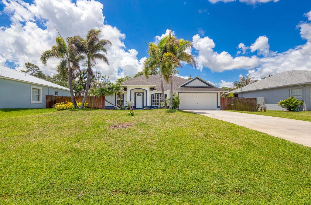 Photo of 1634 SW Duclair Avenue, Port Saint Lucie, FL 34953 (MLS # B26038870)