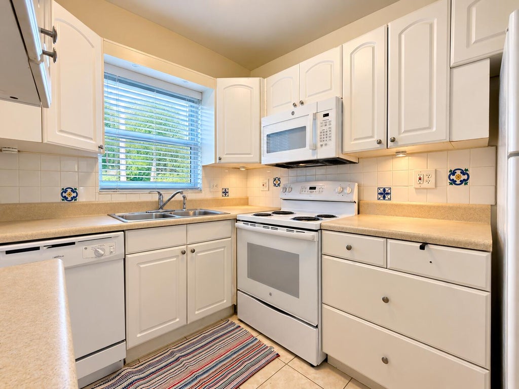 Photo of 111 Cleveland Street #A - 6, Lake Worth Beach, FL 33461 (MLS # B26078302)