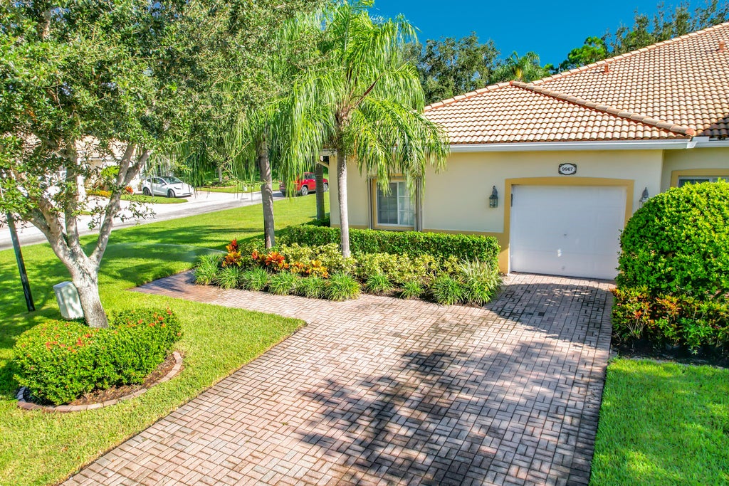 Photo of 9967 GALLEON Drive, West Palm Beach, FL 33411 (MLS # B26074094)