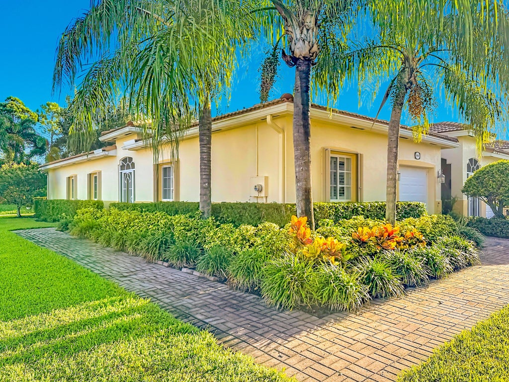 Photo of 9967 GALLEON Drive, West Palm Beach, FL 33411 (MLS # B26074094)