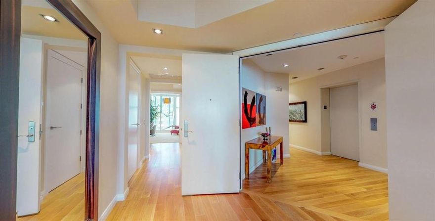 Timelessly decorated and furnished by world renown designer David Lindley of London. This elegant residence  features hard-wood  floors,  bright colored walls and custom made Lindley of London furnishings.