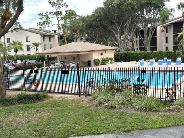 Photo of 202 Foxtail Drive #F1, Greenacres, FL 33415 (MLS # B26022362)