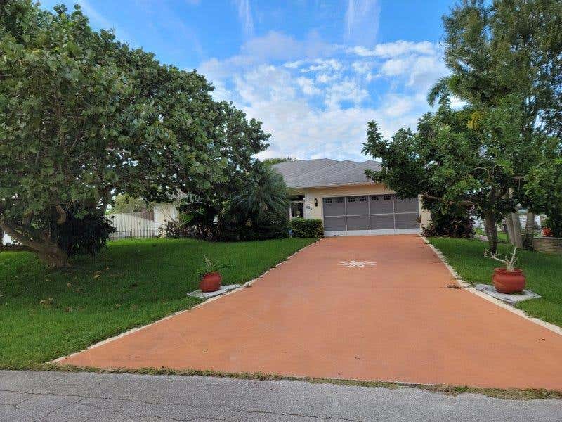 Photo of 685 SW Sail Terrace, Port Saint Lucie, FL 34953 (MLS # R10760802)