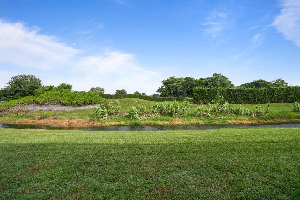 Photo of 104 Citrus Lane #104, Davie, FL 33325 (MLS # B26093827)