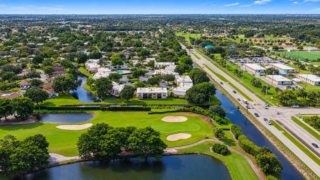 Photo of 104 Citrus Lane #104, Davie, FL 33325 (MLS # B26093827)