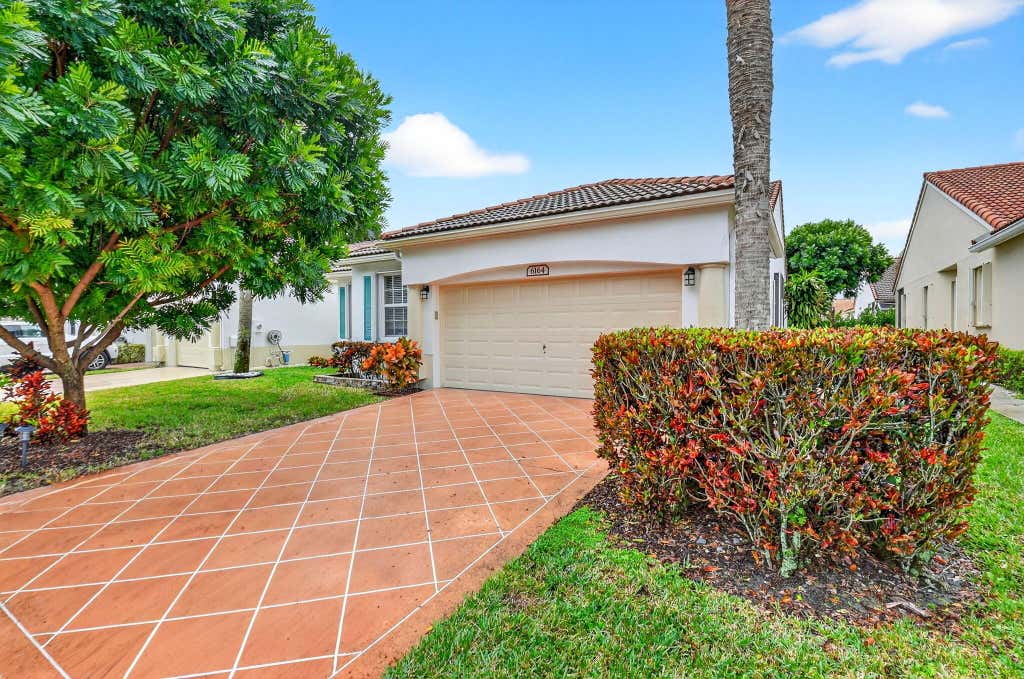 Photo of 6164 Petunia Road, Delray Beach, FL 33484 (MLS # R11147967)