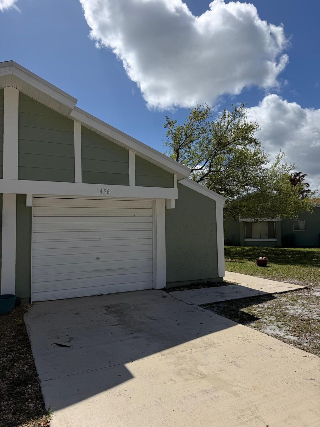 Photo of 1456 SE Rivergreen Circle, Port Saint Lucie, FL 34952 (MLS # B26007469)