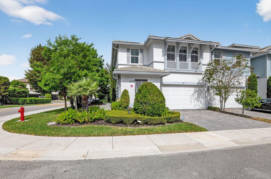 Gorgeous townhouse with master bedroom downstairs.  The upstairs has 3 bedrooms with a loft.  Impact windows throughout.  Wood floors downstairs with LVT floors upstairs.