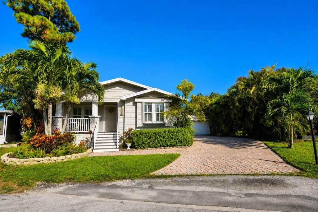 Photo of 6164 N Ironwood Lane, Atlantis, FL 33462 (MLS # B26076519)