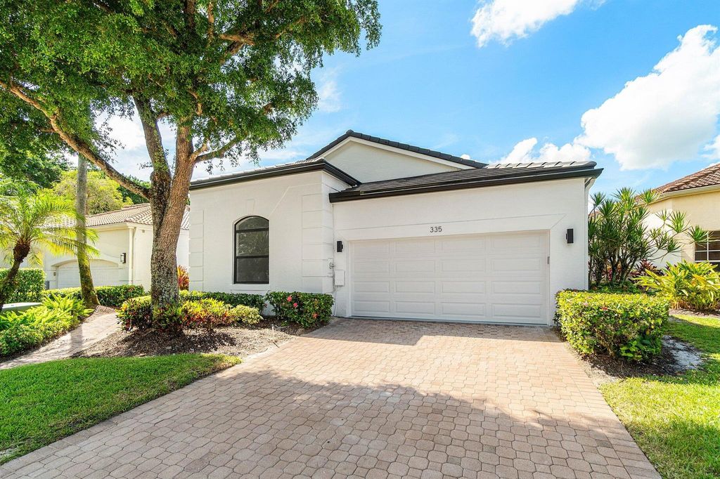 Photo of 335 Sunset Bay Lane, Palm Beach Gardens, FL 33418 (MLS # R11109448)