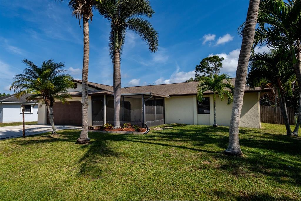 Photo of 831 SE Starflower Avenue, Port Saint Lucie, FL 34983 (MLS # R10703069)