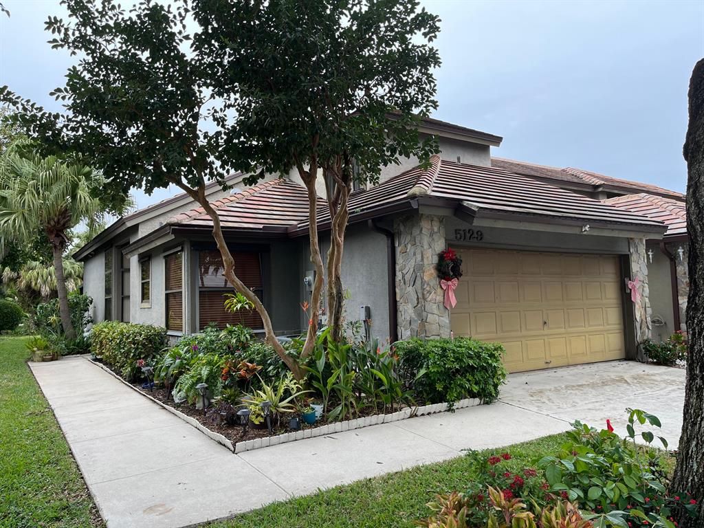 Photo of 5129 Thyme Drive, Palm Beach Gardens, FL 33418 (MLS # R10853955)