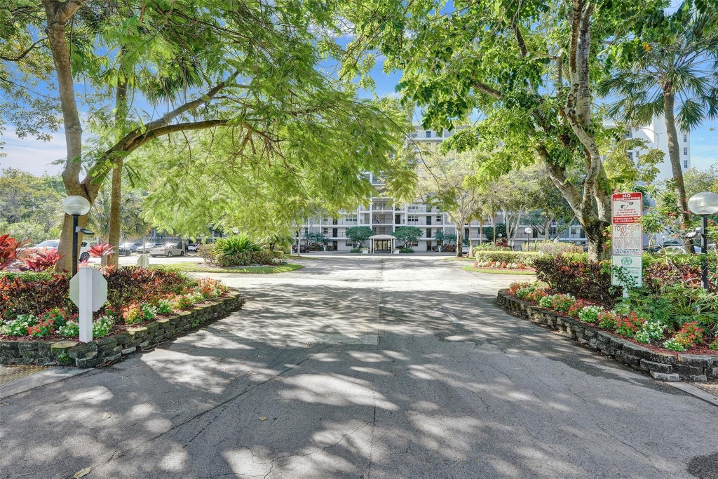 Photo of 2900 N Course Drive #202, Pompano Beach, FL 33069 (MLS # F10504169)