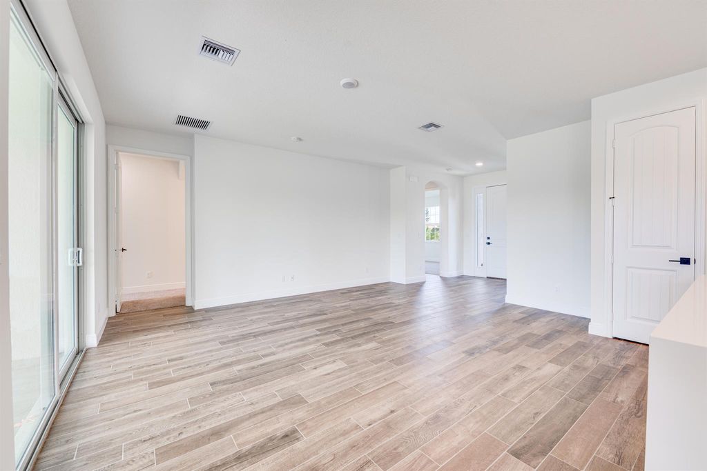 Photo of 5811 NW Dooley Circle, Port Saint Lucie, FL 34986 (MLS # R10987819)