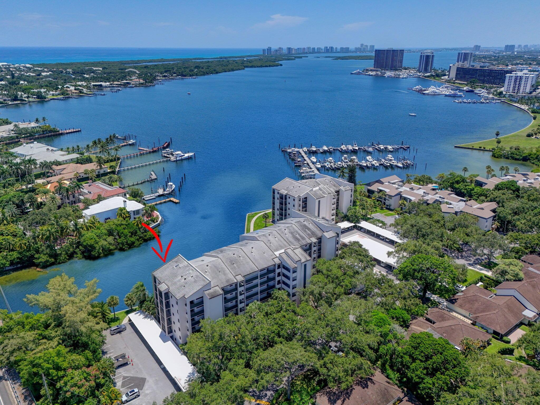 ONE OF A KIND, PENTHOUSE, NE Corner END UNIT with panoramic water views and additional 400 sf loft! Two terraces, large terrace facing east with beautiful water views of Lake and Marina as far as the eye can see! This former builder's model and residence has many upgrades and special features. Natural wood accents, marble floors in foyer, dining and living rooms. Cherry wood floors in bedroom. Sliders to terraces with amazing water views. Master bath has dual vanities, separate tub, and shower. Kitchen with built-ins and breakfast nook. Gorgeous Dining area with NE terrace and Oak bulit-ins. Beautiful guest room with full bath. Upstairs spacious loft a bonus room/office with skylights and lookout terrace! Laundry in unit, carport plus guest parking. Pets welcome DOCKS available